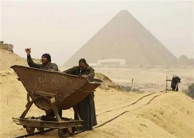 Workers excavating tombs associated with pyramid-building communities at Giza